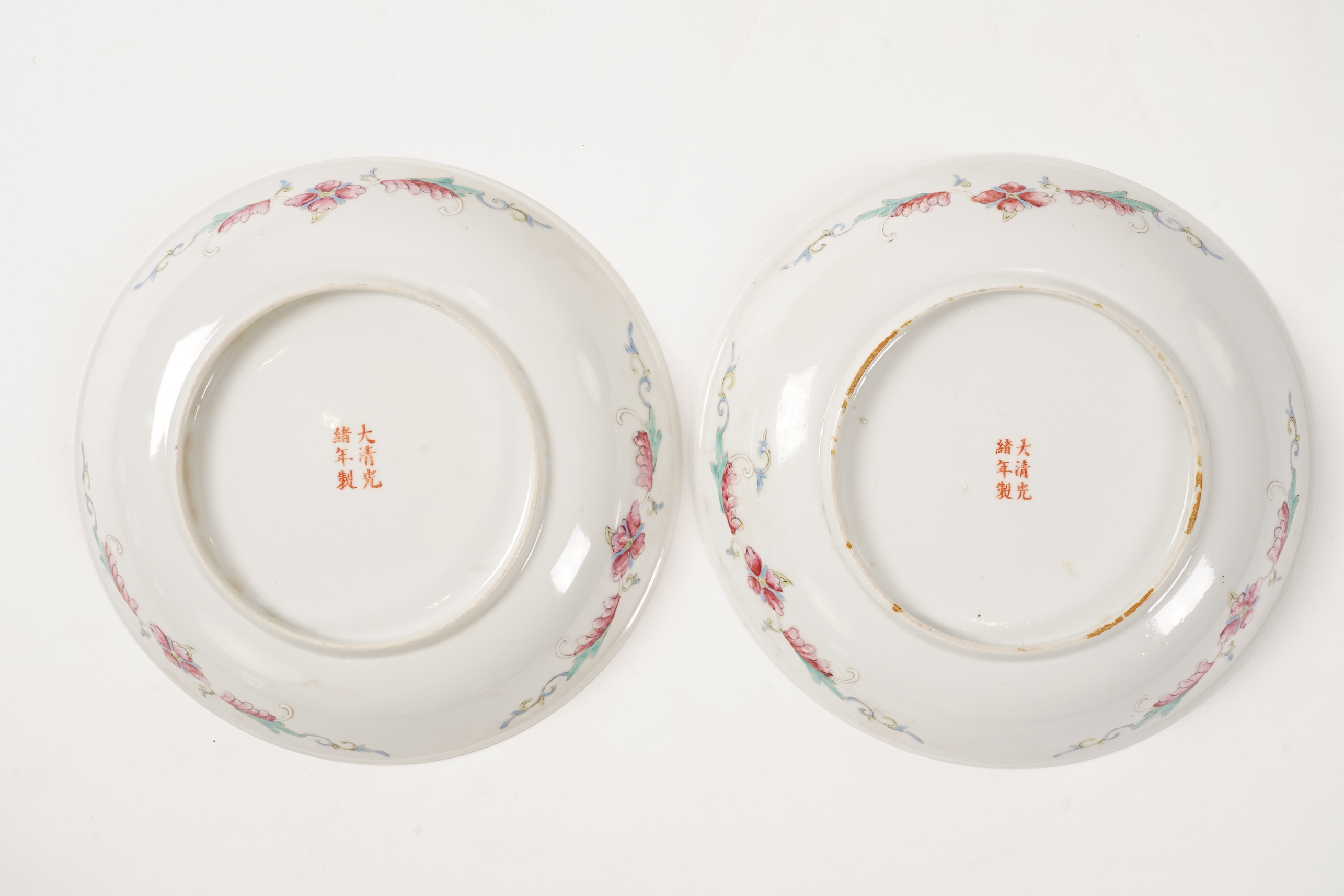 A pair of Chinese yellow ground medallion saucer dishes, Guangxu six character marks, early 20th century